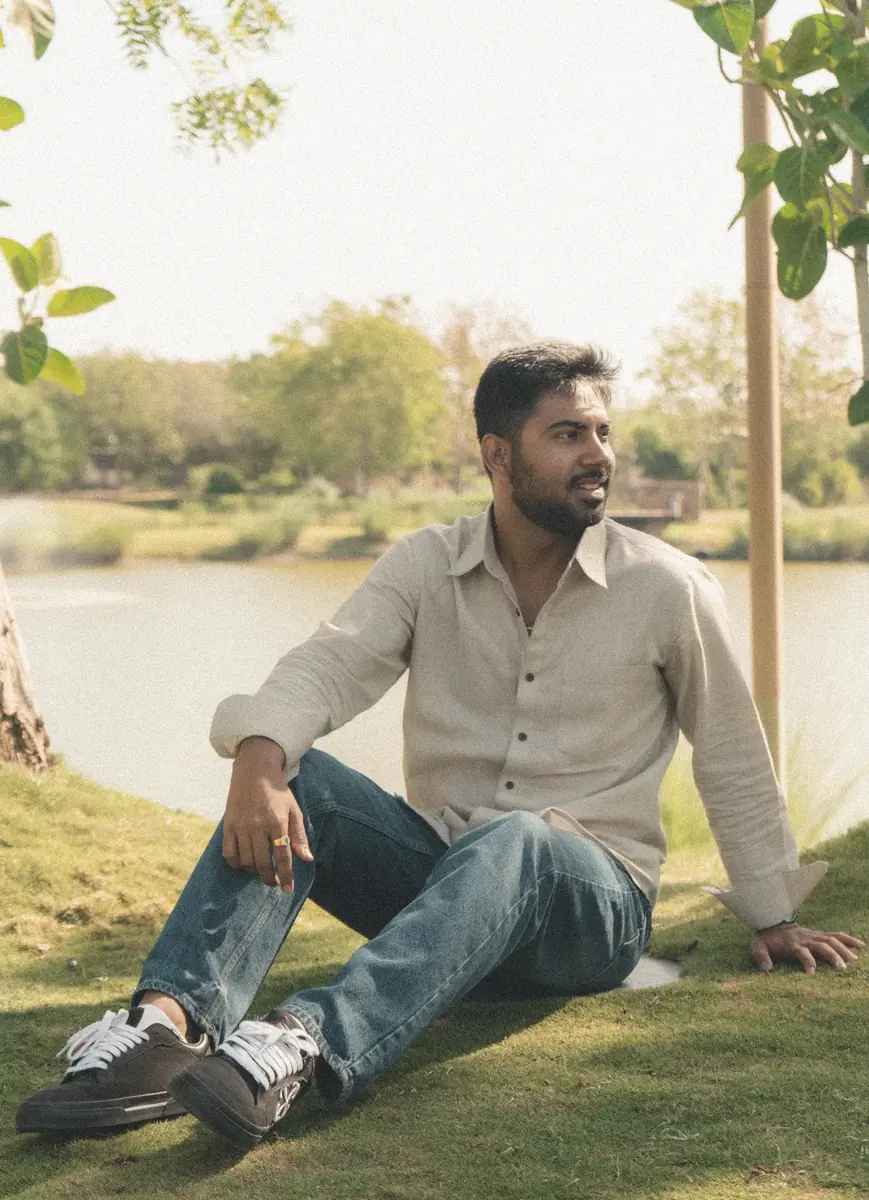 Canndi field study seated beside a lake
